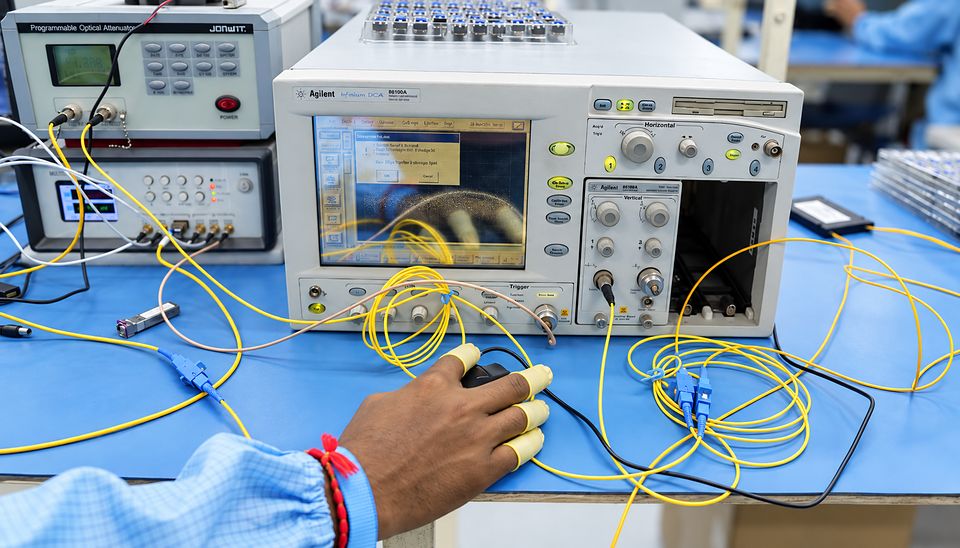 A Syrotech optical test bench with yellow fiber patch cords